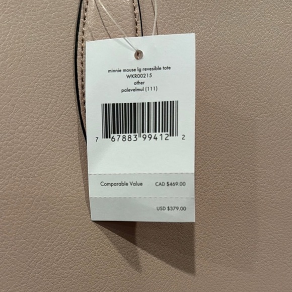 Kate Spade Pink and Black Minnie Mouse Tote
Retail Price is 379.00 - Picture 4 of 6